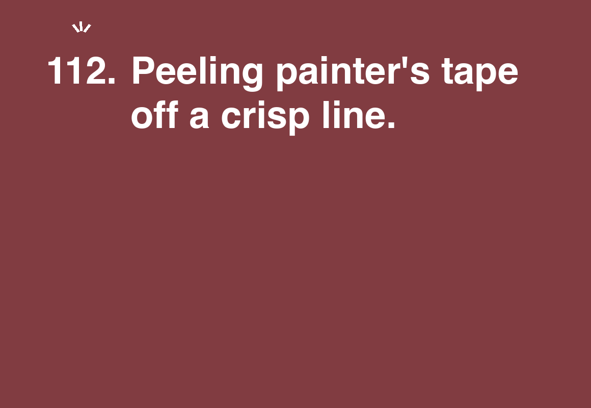 Peeling painter's tape off a crisp line. — card 112 of the 1000 little things list