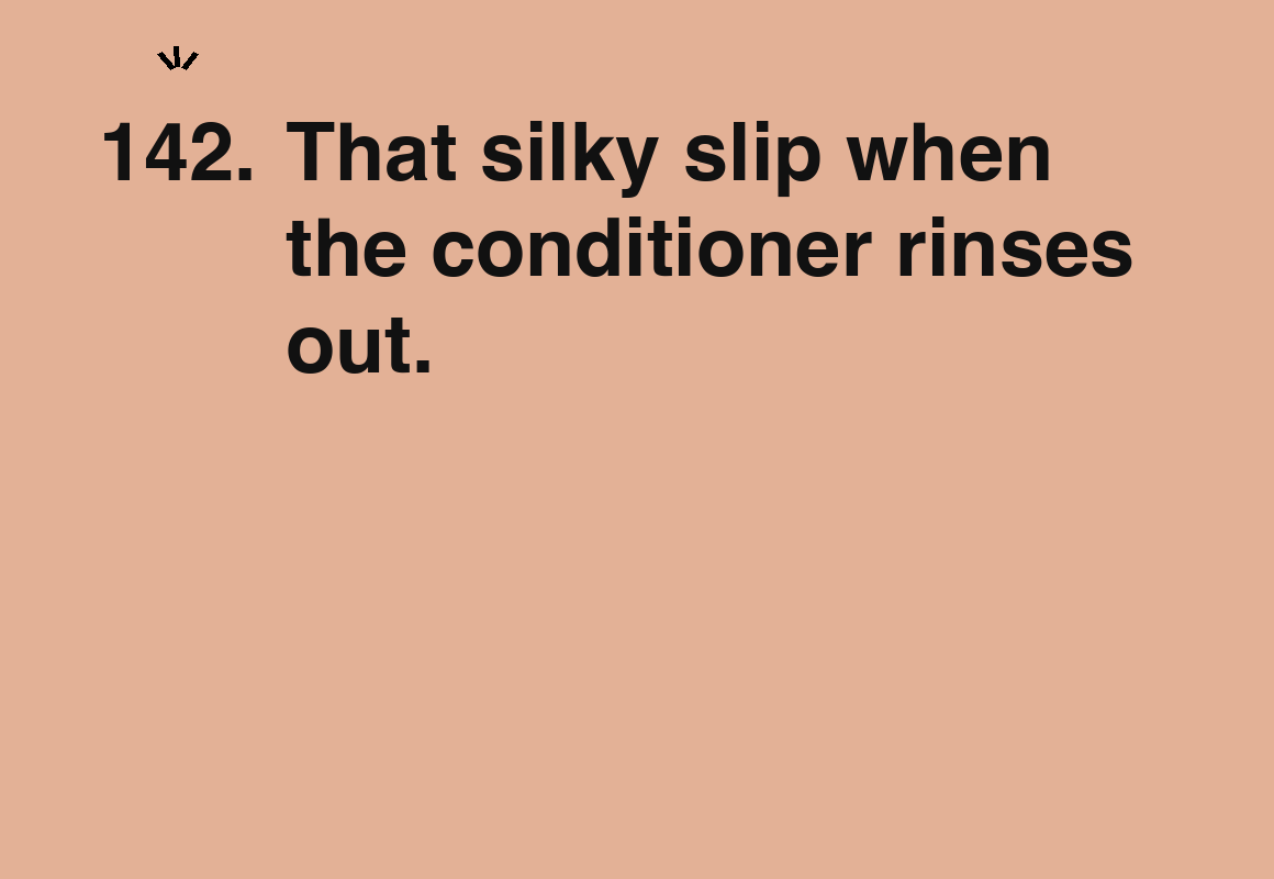 That silky slip when the conditioner rinses out. — card 142 of the 1000 little things list