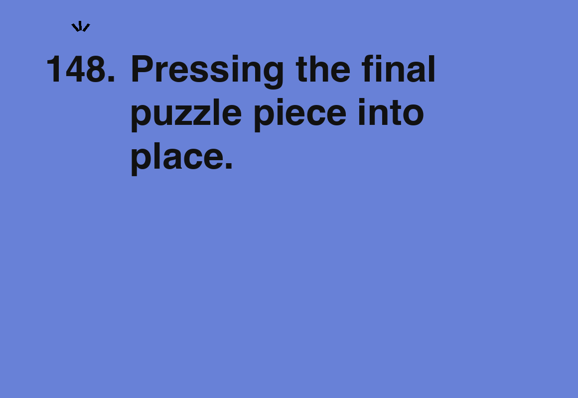 Pressing the final puzzle piece into place. — card 148 of the 1000 little things list