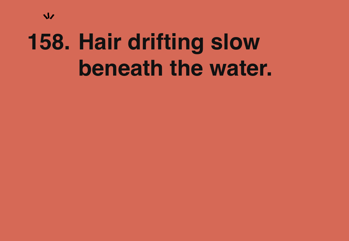 Hair drifting slow beneath the water. — card 158 of the 1000 little things list