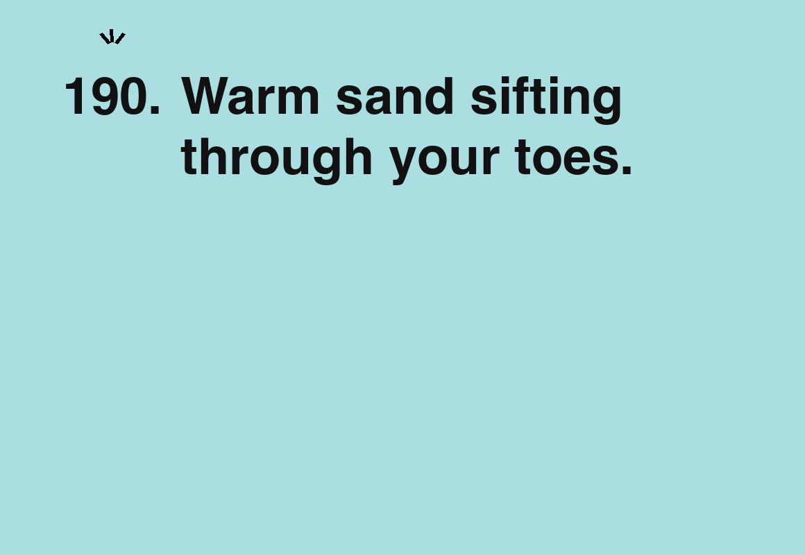 Warm sand sifting through your toes. — card 190 of the 1000 little things list