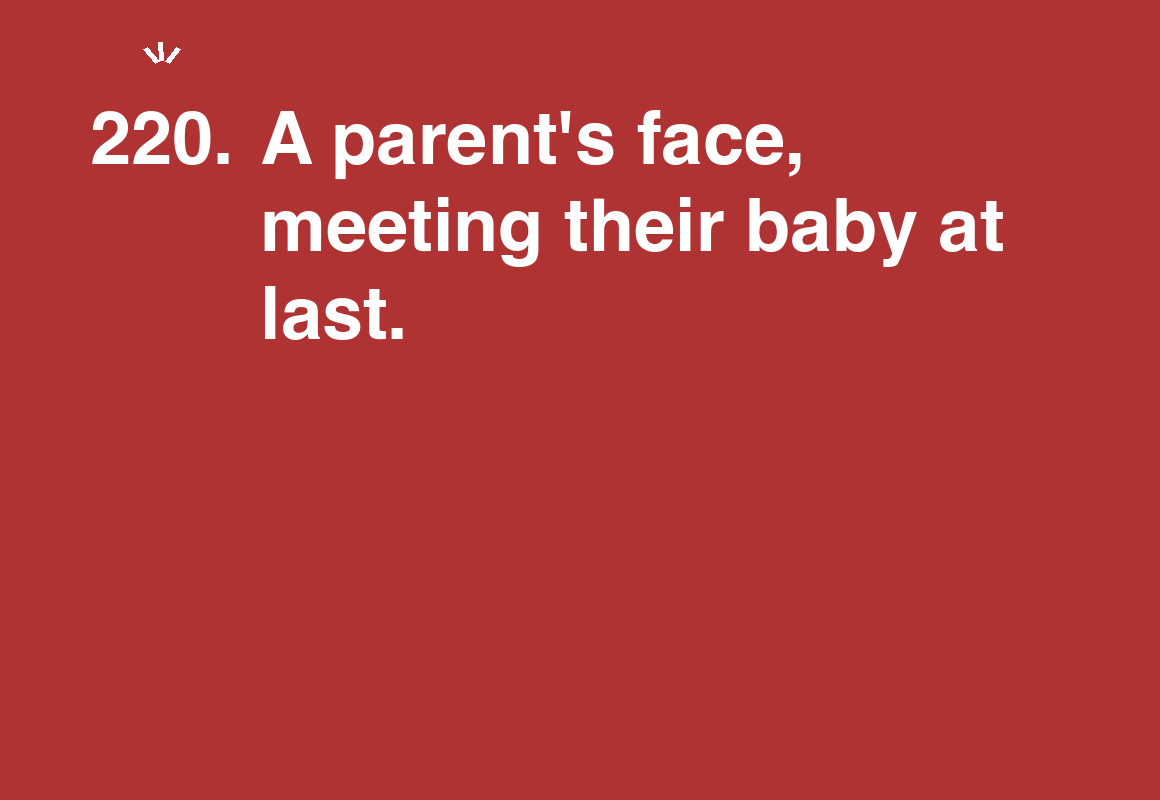 A parent's face, meeting their baby at last. — card 220 of the 1000 little things list