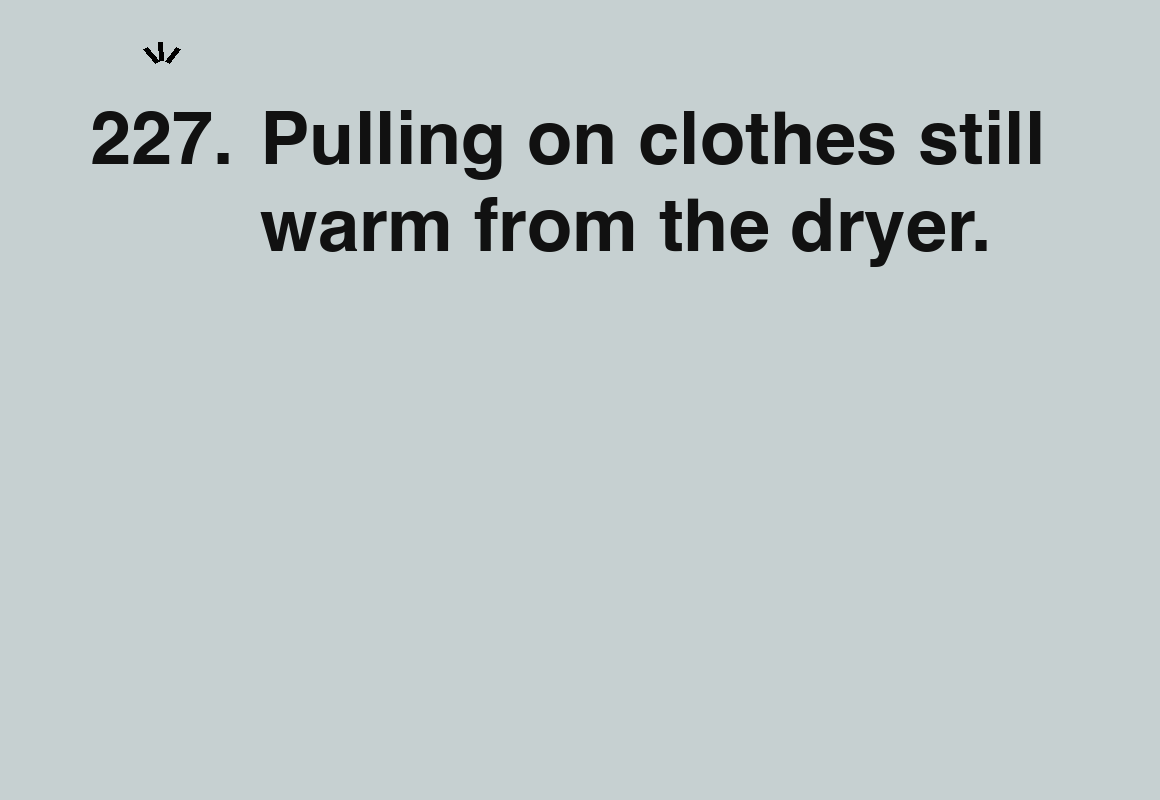 Pulling on clothes still warm from the dryer. — card 227 of the 1000 little things list