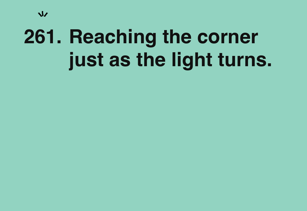 Reaching the corner just as the light turns. — card 261 of the 1000 little things list