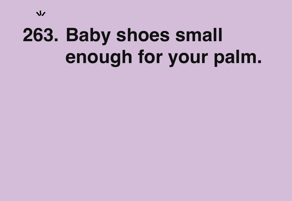 Baby shoes small enough for your palm. — card 263 of the 1000 little things list