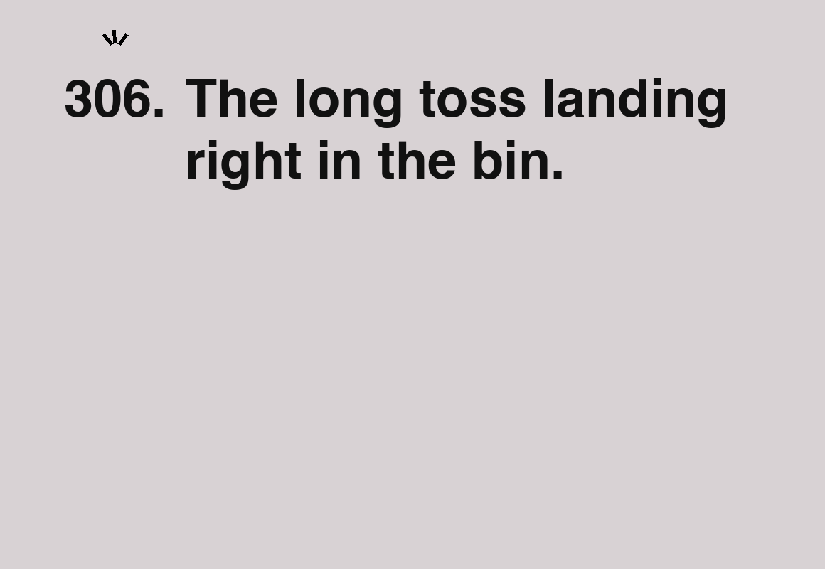 The long toss landing right in the bin. — card 306 of the 1000 little things list