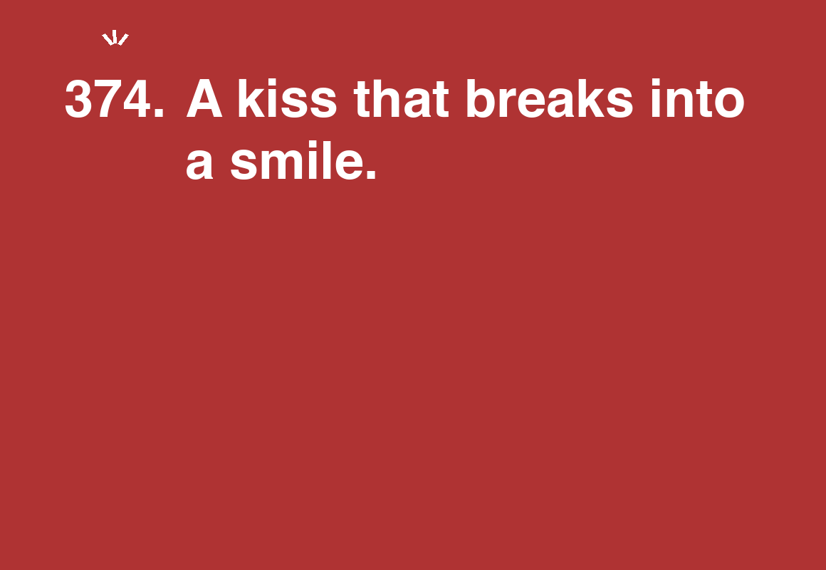 A kiss that breaks into a smile. — card 374 of the 1000 little things list