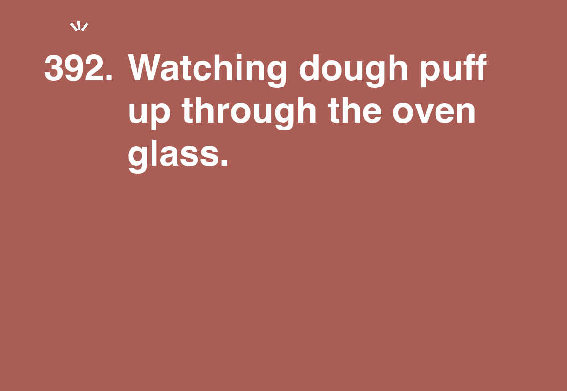 Watching dough puff up through the oven glass. — card 392 of the 1000 little things list