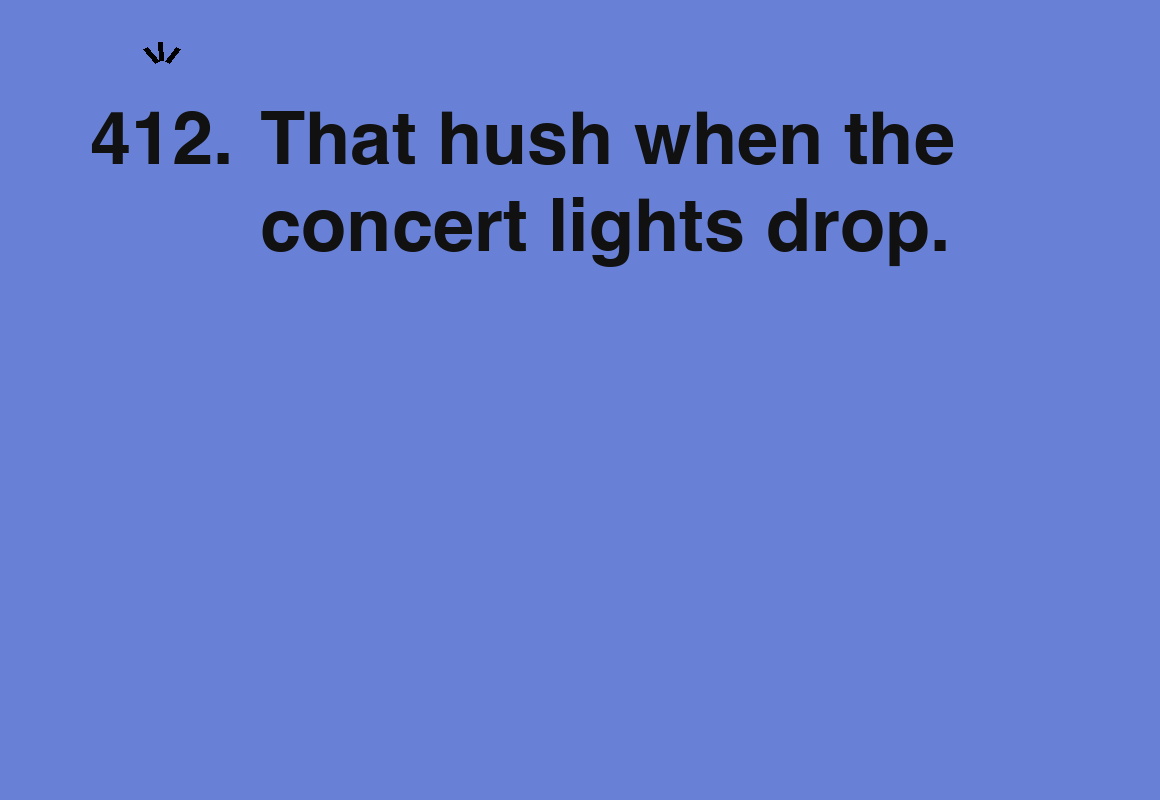That hush when the concert lights drop. — card 412 of the 1000 little things list