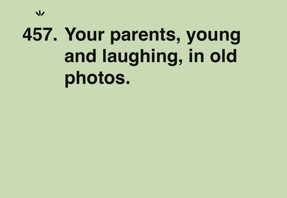 Your parents, young and laughing, in old photos. — card 457 of the 1000 little things list