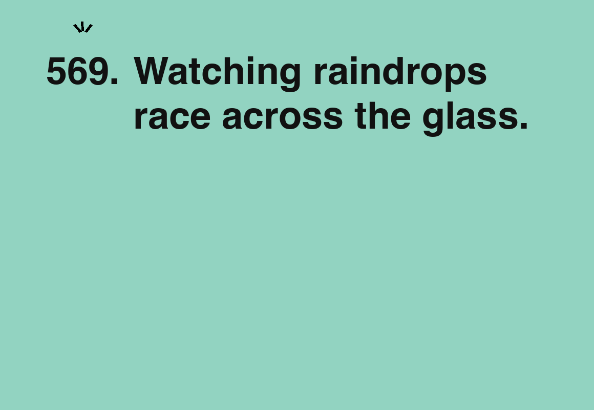 Watching raindrops race across the glass. — card 569 of the 1000 little things list