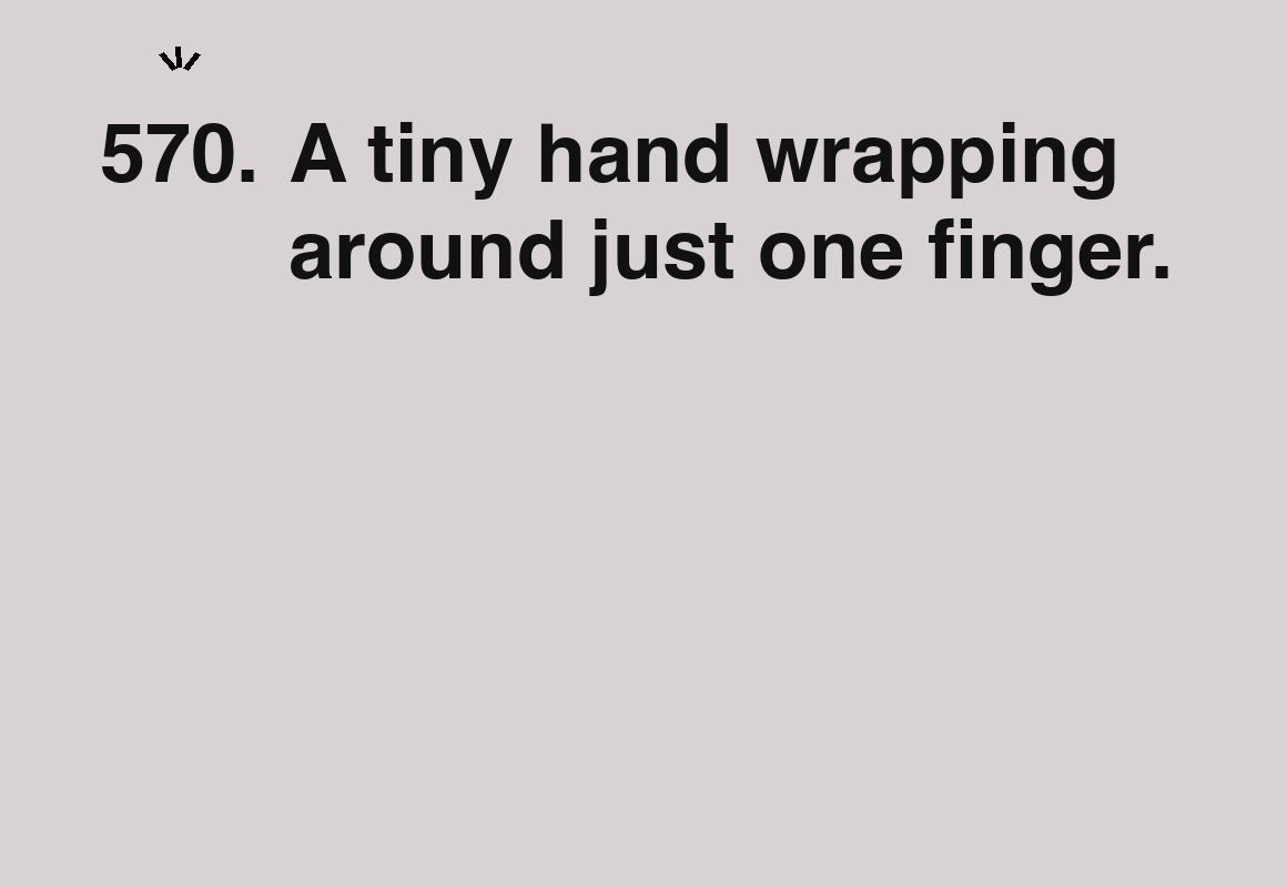 A tiny hand wrapping around just one finger. — card 570 of the 1000 little things list