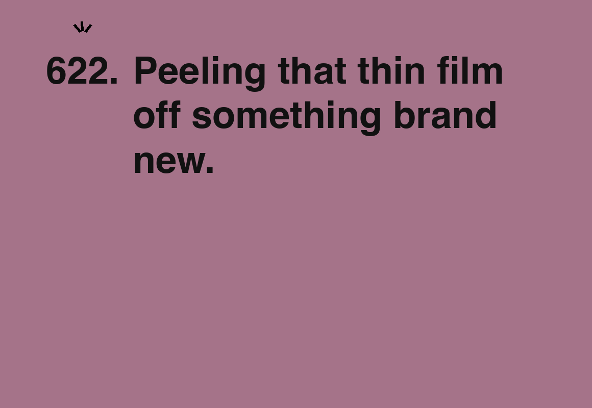 Peeling that thin film off something brand new. — card 622 of the 1000 little things list
