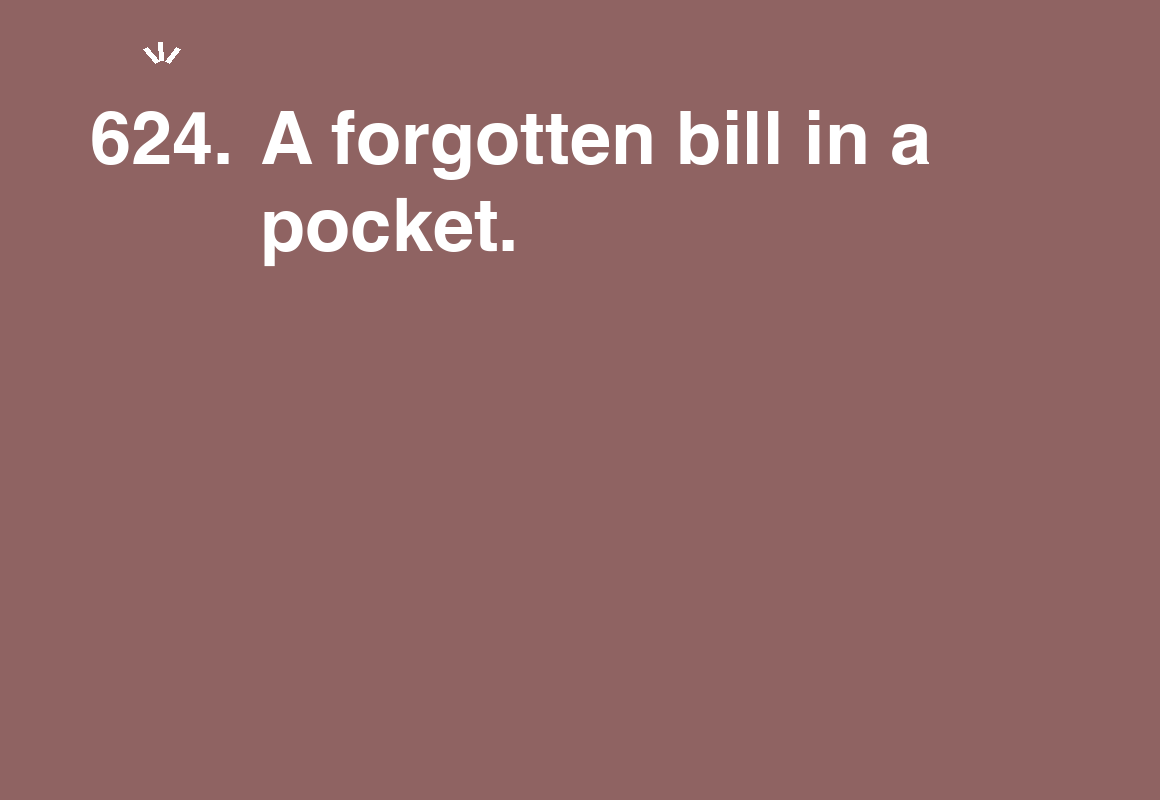 A forgotten bill in a pocket. — card 624 of the 1000 little things list