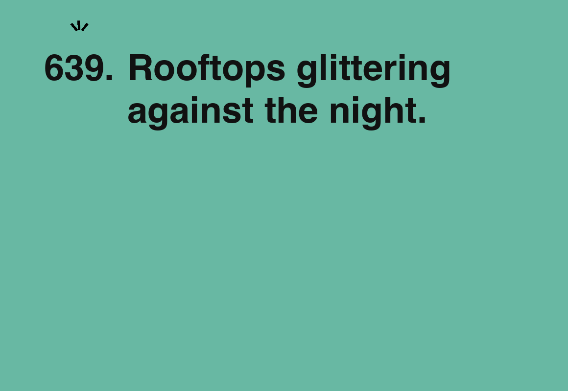 Rooftops glittering against the night. — card 639 of the 1000 little things list
