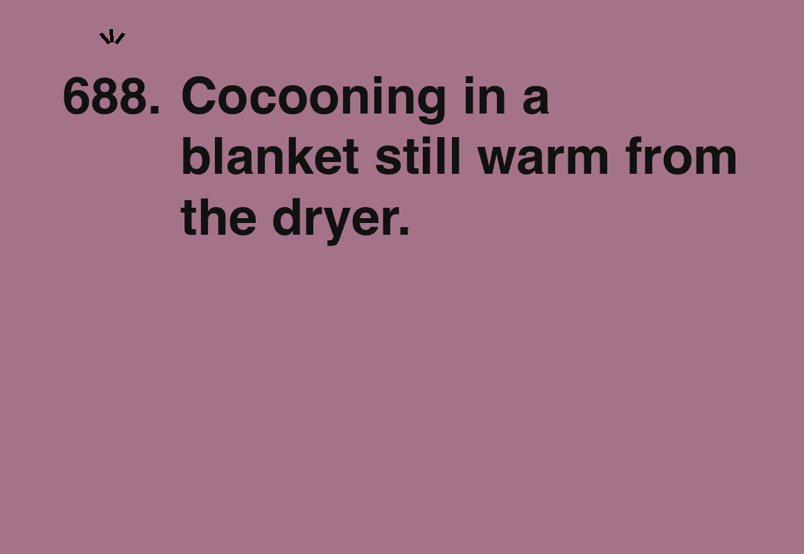 Cocooning in a blanket still warm from the dryer. — card 688 of the 1000 little things list