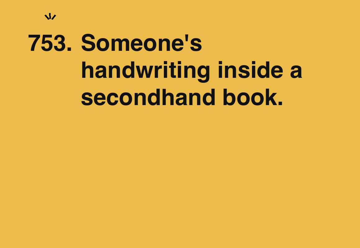 Someone's handwriting inside a secondhand book. — card 753 of the 1000 little things list
