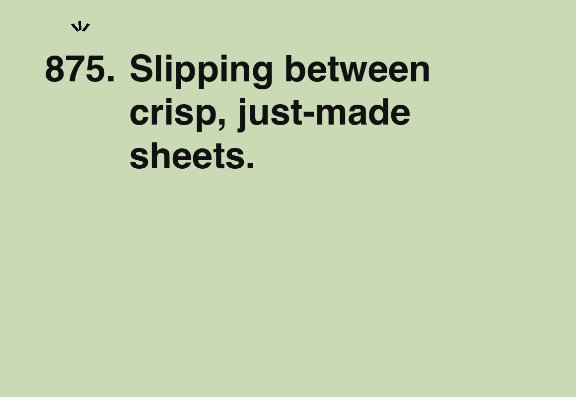 Slipping between crisp, just-made sheets. — card 875 of the 1000 little things list