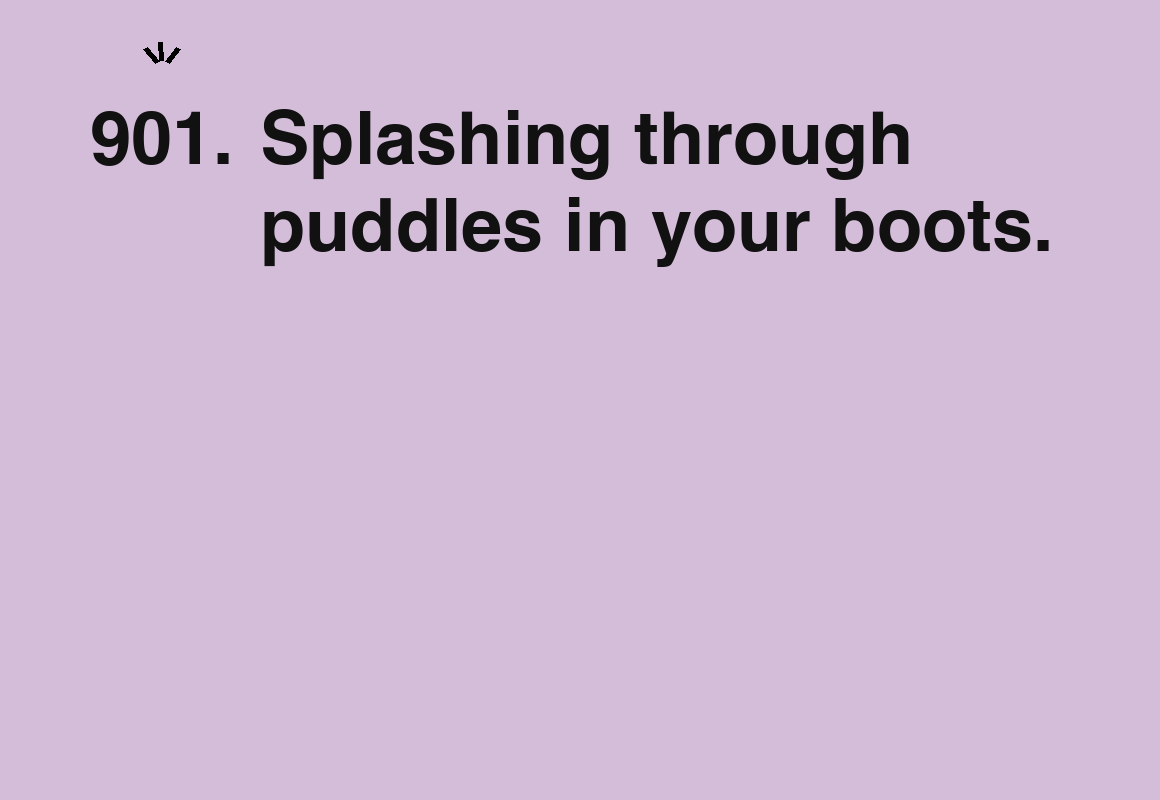 Splashing through puddles in your boots. — card 901 of the 1000 little things list